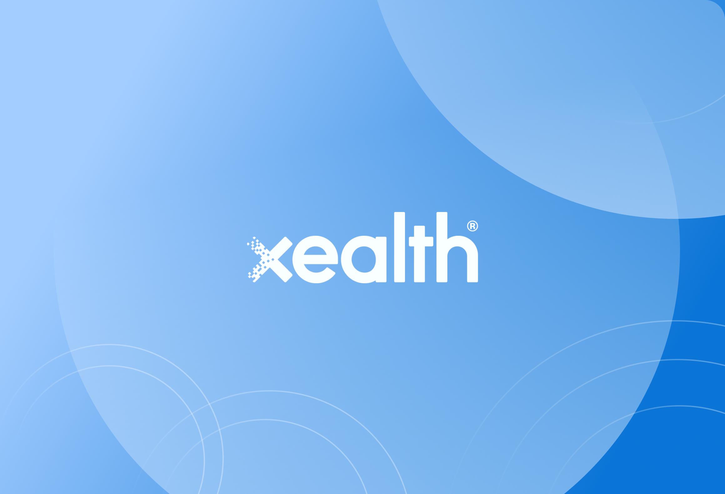 white xealth logo on a blue background